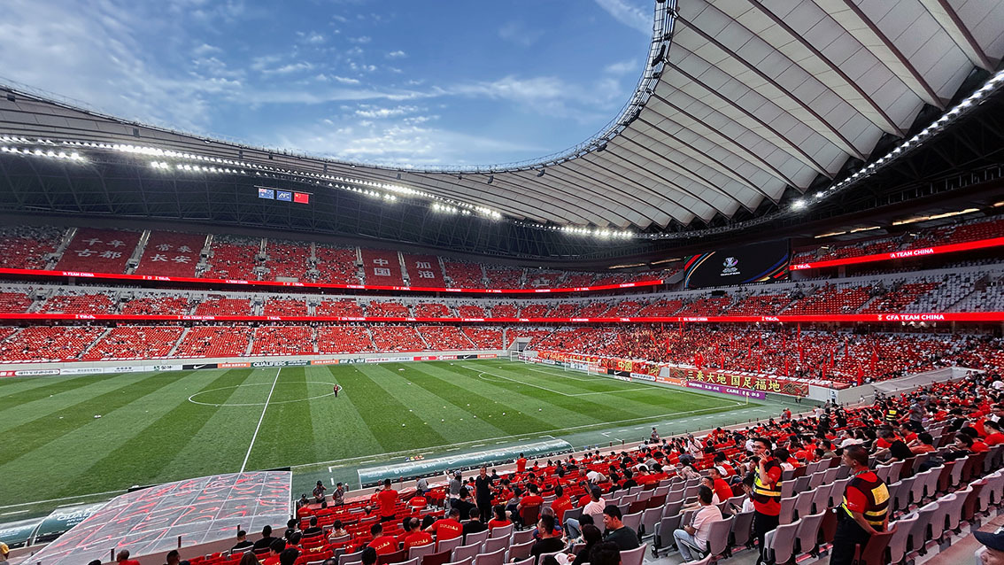 Xi'an International Football Center with a QSTECH LED ring display above the grandstand