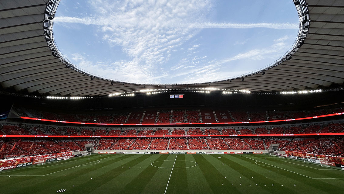 QSTECH LED banner display integrated with the Zhou Qin Han Tang inspired architecture of Xi'an International Football Center